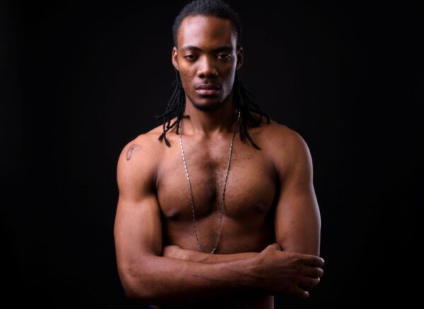 male vulnerability healing story young-handsome-muscular-african-man-with-dreadlock